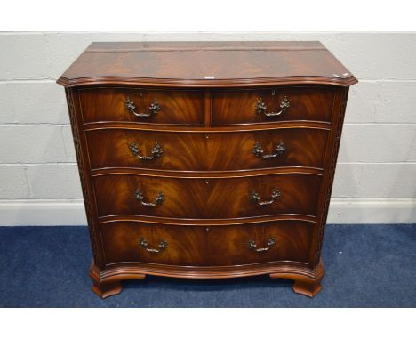 A REPRODUCTION FLAME MAHOGANY AND CROSSBANDED SERPENTINE CHEST OF TWO OVER THREE DRAWERS, in the George III style, with cante
