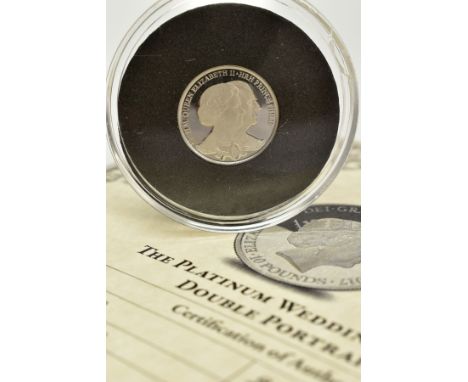 A PLATINUM QUEEN ELIZABETH AND PRINCE PHILIP, 70TH WEDDING ANNIVERSARY DOUBLE PORTRAIT COIN, within a clear case, accompanied