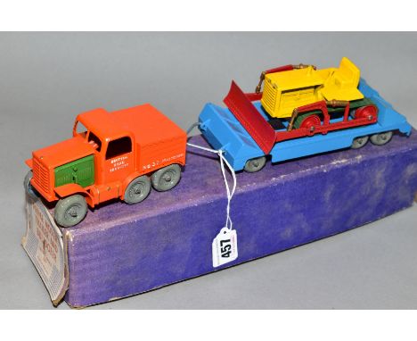 A BOXED LESNEY MOKO PRIME MOVER, TRAILER AND BULLDOZER, orange prime mover with both green engine covers, blue trailer with t