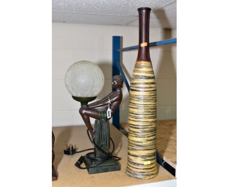 A MODERN ART DECO STYLE TABLE LAMP of seated woman holding satin crackled glass ball, height 42cm, with a Native art style na