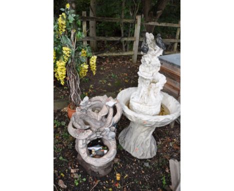 TWO GARDEN WATER FEATURES including a composite two piece in the form of two rock pools above a planting area 67cm high, toge