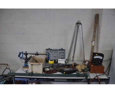 A COLLECTION OF INSPECTION AND TEST EQUIPMENT including a vintage Stanley Surveyors level tripod and measure, a Avometer 8, a