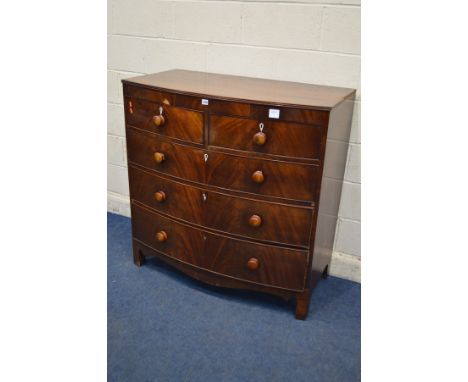 A VICTORIAN MAHOGANY BOW FRONT CHEST OF TWO OVER THREE LONG GRADUATED DRAWERS, on bracket feet, width 112cm x depth 58cm x he