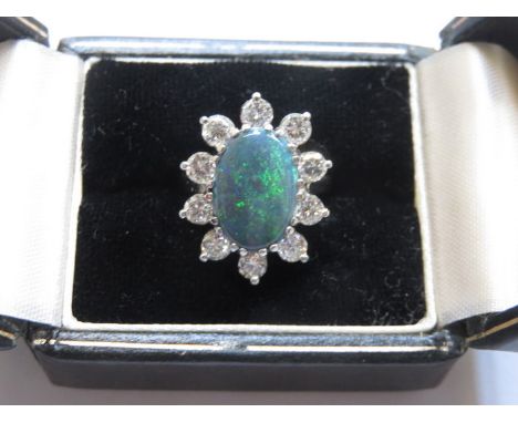 18ct WHITE GOLD OPAL AND DIAMOND SET LADIES DRESS RING 