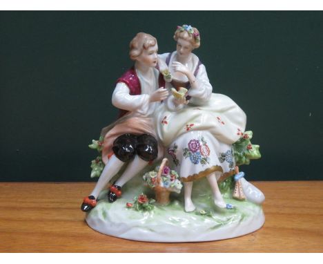 CONTINENTAL GLAZED CERAMIC FIGURE GROUP, APPROXIMATELY 17cm HIGH 