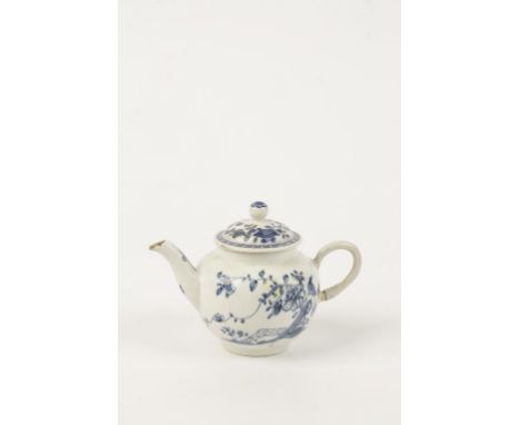 A FIRST PERIOD WORCESTER BLUE AND WHITE MINIATURE TEAPOT AND COVER, decorated with the "Rock Warbler" pattern, workman's nume
