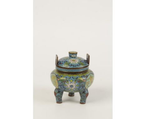 A CHINESE CLOISONNÉ TRIPOD CENSER, made for the Middle Eastern Market, the domed lid and sides with lotus scroll decoration, 