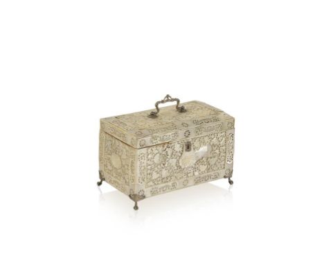 A CHINESE EXPORT MOTHER OF PEARL AND SILVER MOUNTED CADDY, with rococo silver mounts, the gently domed lid and sides ornately