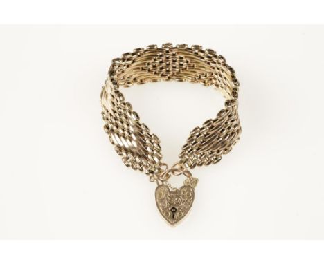 A 9CTS ROSE GOLD GATE LINK BRACELET, with engraved padlock clasp, (c.27gms)