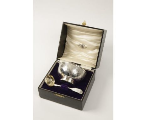 A VICTORIAN SILVER CHRISTENING BOWL of circular form with gadrooned border, engraved aesthetic movement decoration, gilt wash