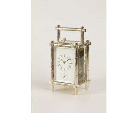 A FRENCH SILVER PLATED BAMBOO STYLE REPEATING CARRIAGE CLOCK, the white enamel dial with Roman numerals and subsidiary alarm 