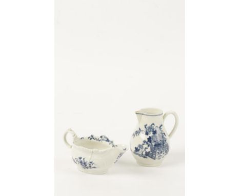 A FIRST PERIOD WORCESTER BLUE AND WHITE CREAM JUG decorated with the "Zig-Zag Fence" pattern and underglazed blue crescent "C