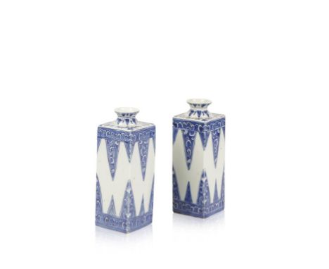 A PAIR OF CHINESE BLUE AND WHITE VASES, the square sides painted with geometric designs with stylised ruyi bands, bears Leona