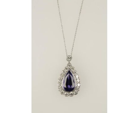 A DIAMOND AND TANZANITE PENDANT, the pear-shaped tanzanite c.1.90cts, surrounded by a border of 17 round-cut diamonds, attach