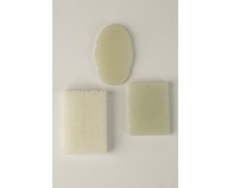 A CHINESE WHITE JADE PENDANT, with figural and calagraphic caned decoration, together with two further celadon jade pendants 