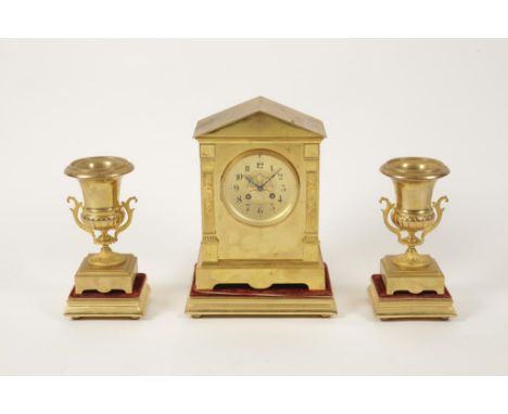 JOHN WILLIAMS: AN EARLY 20TH CENTURY GILT METAL MANTEL CLOCK, the 4" dial with Arabic numerals, two train French movement str