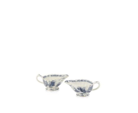 A PAIR OF FIRST PERIOD WORCESTER BLUE AND WHITE BUTTER BOATS, the moulded bodies with a chinoiserie pattern, circa 1765, 4.5"