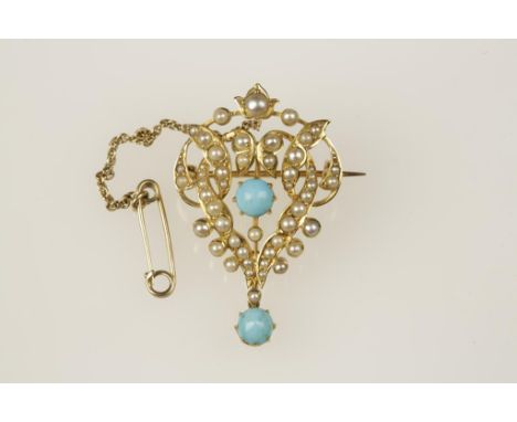 AN EDWARDIAN 15CTS YELLOW GOLD PENDANT, the open work oval frame decorated with seed pearls and a single turquoise to the cen