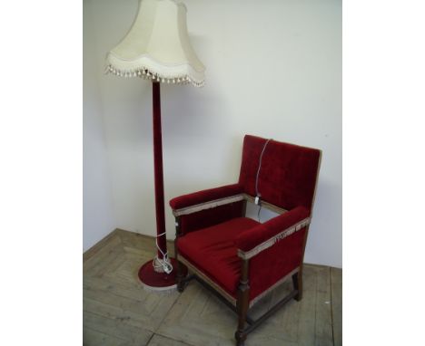 Edwardian mahogany framed armchair with upholstered seat, back and arms (the base fitted with unusual lamp and alarm bell mec