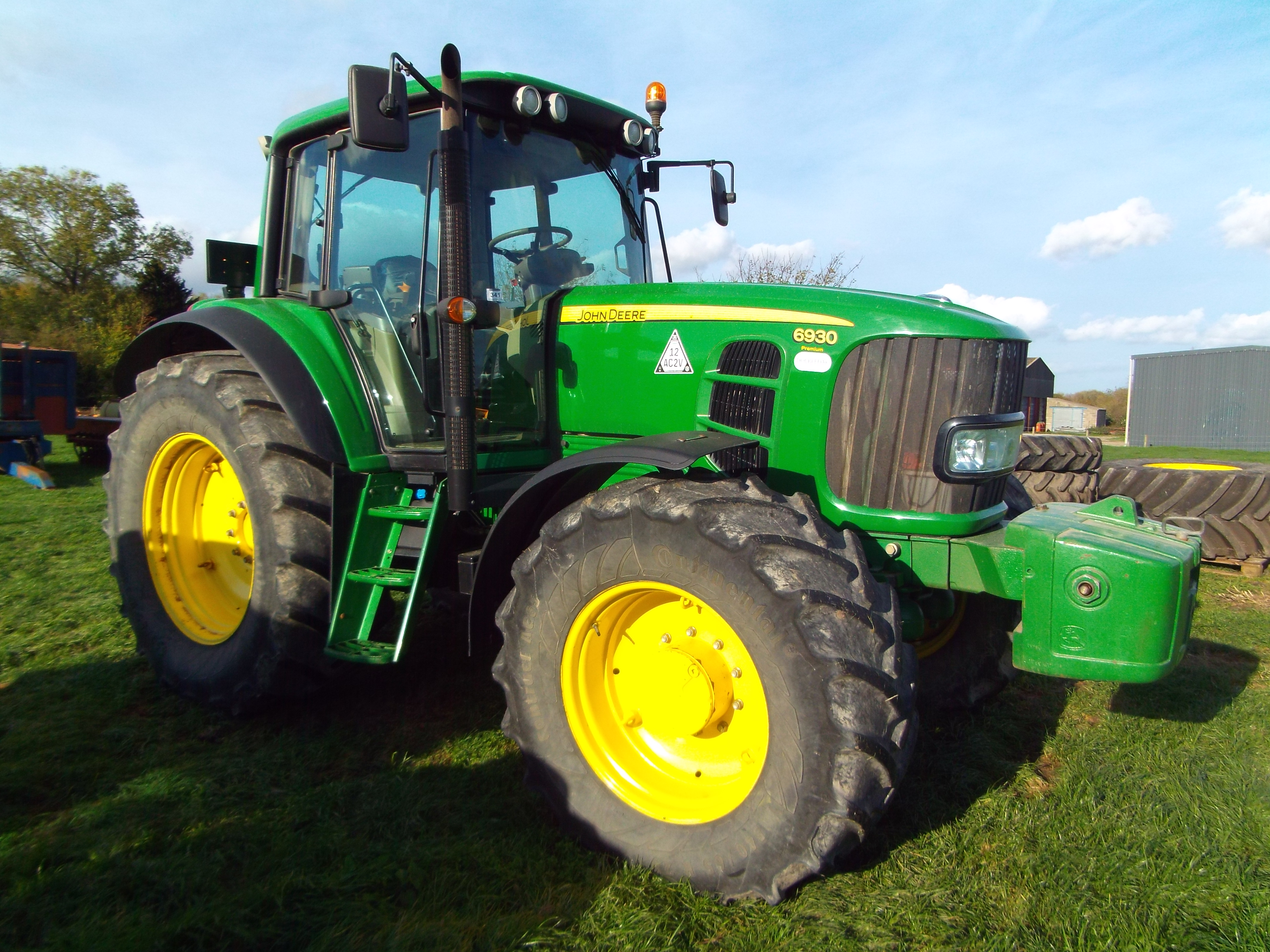 John Deere 6930 Tractor Premium with cab and front axle suspension