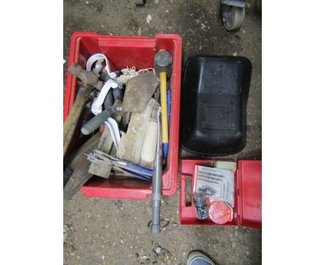 A box of hand tools with welding mask