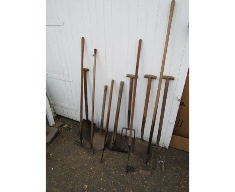 Mixed garden hand tools including shovels and forks 