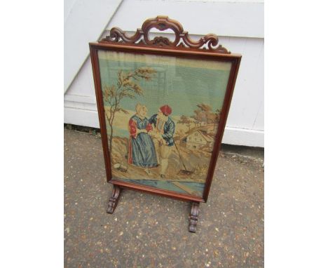 Mahogany framed fire screen with tapestry behind glass 