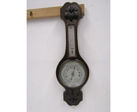 Carved oak wheel barometer 