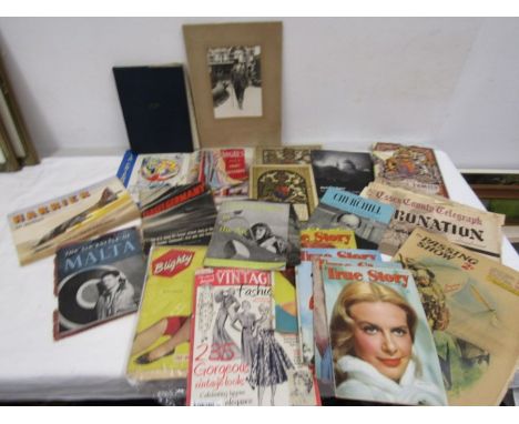 A collection of vintage magazines, books and postcards plus newspapers relating to 9/11
