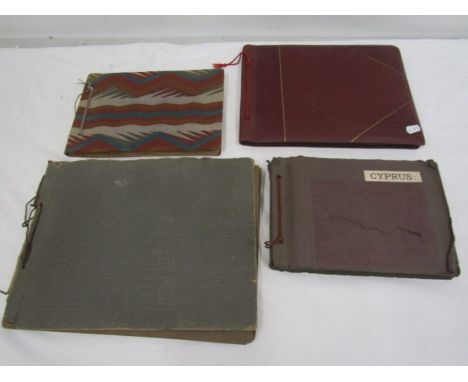 A collection of vintage holiday photo's and postcards in 4 albums, most in 1930s
