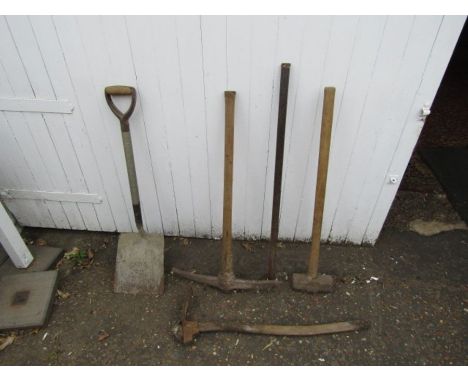 Tools including pick axe and sledge hammer etc 