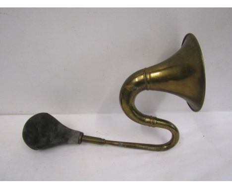 A vintage brass horn