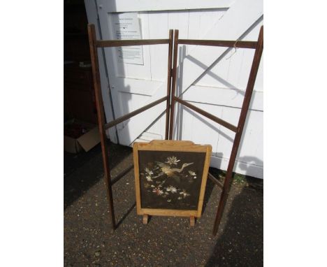 A vintage clothes airer and a tapesty fire screen