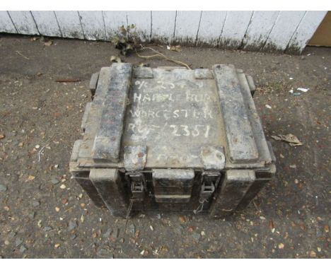 Vintage wooden ammo box containing metal items 