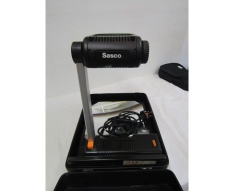 A Sasco overhead projector in case