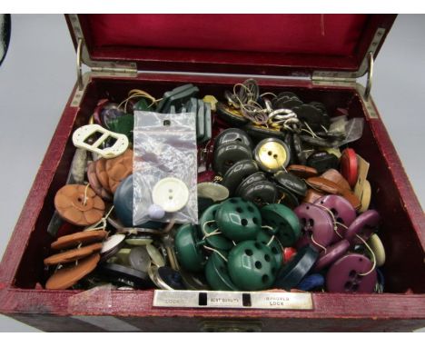 A vintage box of buttons