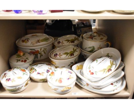 A collection of Royal Worcester 'Evesham' oven to tableware including casserole dishes and serving platters etc. (14 pieces).