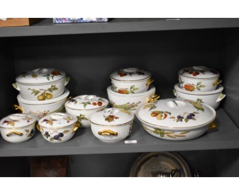 An assorted collection of Royal Worcester Evesham patterned lidded tureens of varying sizes, the largest measures 26cm in dia