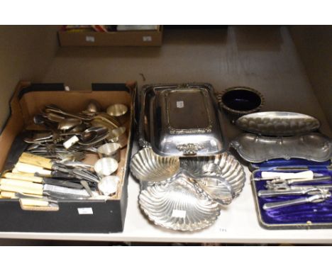 A shelf of plated ware including a tri bon bon dish, boxed shelfish set, serving trays, miniature sauce pans and a selection 