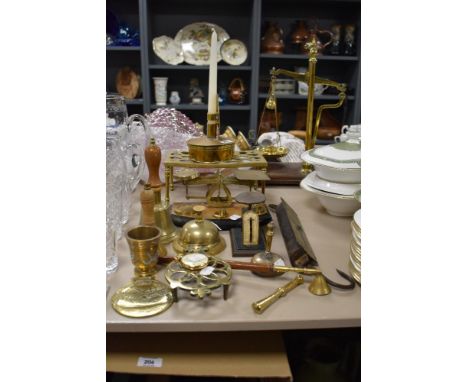 An assorted selection of brass ware including postage stamp scales, letter scales, Salter Spring Balance scales, a mens Gradu