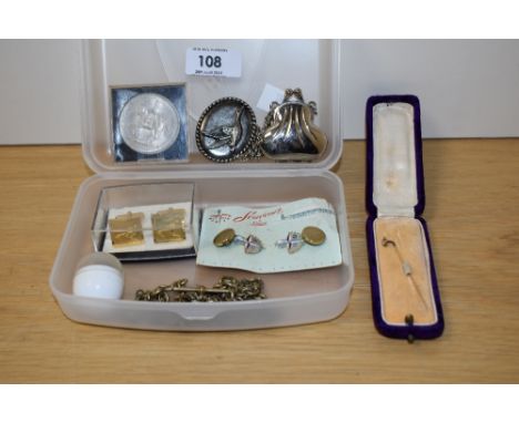 A selection of costume jewellery including cufflinks one pair depicting game birds, a floral motif stick pin and a fob chain 