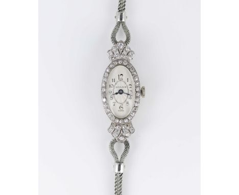 A LADIES FINE SOLID WHITE GOLD & DIAMOND ROLEX COCKTAIL BRACELET WATCHCIRCA 1926, WITH GUILLOCHE DIAL Movement: 15J, manual w