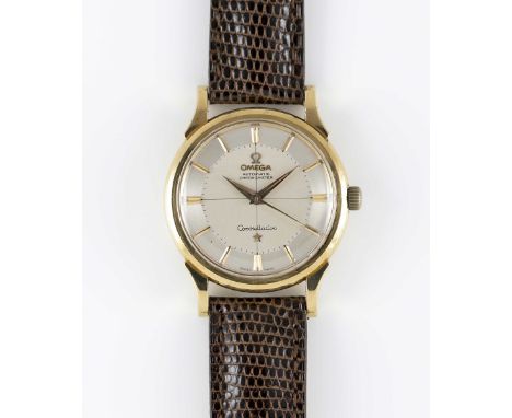 A GENTLEMAN'S 18K SOLID YELLOW GOLD OMEGA CONSTELLATION AUTOMATIC CHRONOMETER WRIST WATCHCIRCA 1960, REF. 143.81 WITH SILVER 
