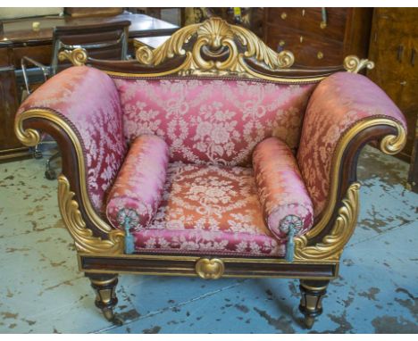 THRONE CHAIR, William IV mahogany and gilt heightened with scroll carved frame and magenta damask upholstery (formerly a sofa