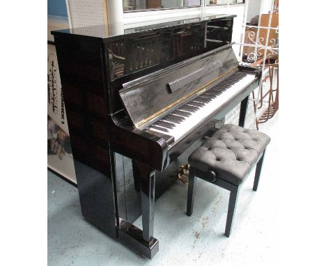 UPRIGHT PIANO, by R Schirimer in black lacquered finish, 151cm L plus a matching stool. (2)