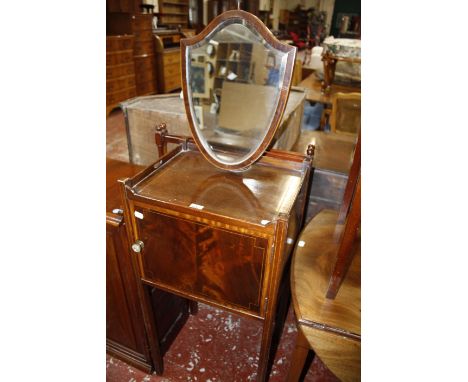 A small mahogany tripod table, with circular top on a ring turned baluster shaft, 17½in wide, with a towel rail and washstand