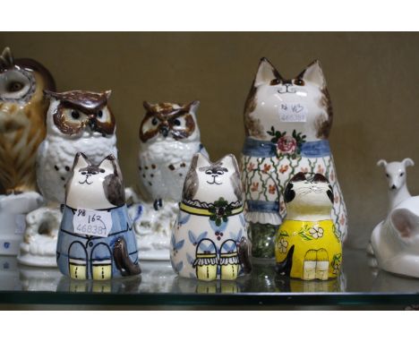 A Lladro owl, marked to base, a quantity of owl figurines, a Royal Copenhagen model of a cat and other animal models
