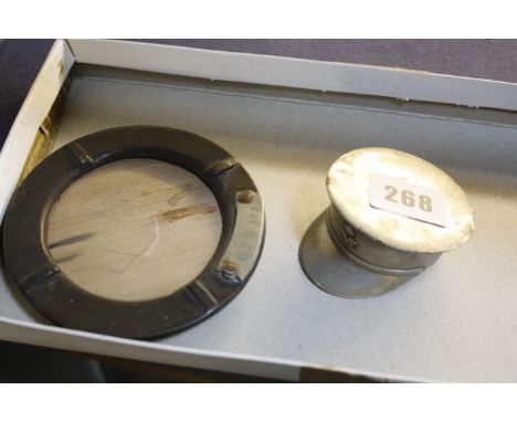 [Militaria] - A Royal Air Force Snuff Box modeled as a peaked cap, chrome finished with hinged lid compartment, winged RAF ea