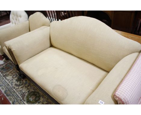 A Georgian style upholstered sofa with matching armchair