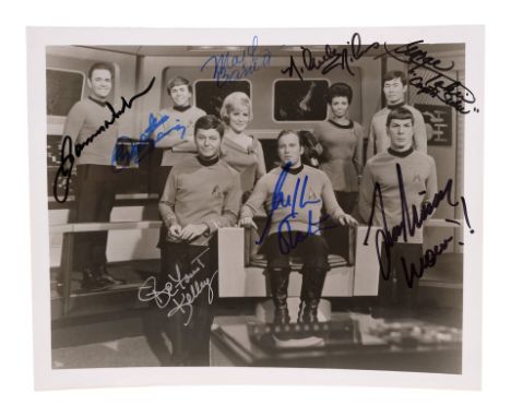 STAR TREK: THE ORIGINAL SERIES (1966-1969) - Full Cast-Autographed Promotional Enterprise Crew Still - A still of the crew of